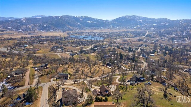 bird's eye view with a mountain view