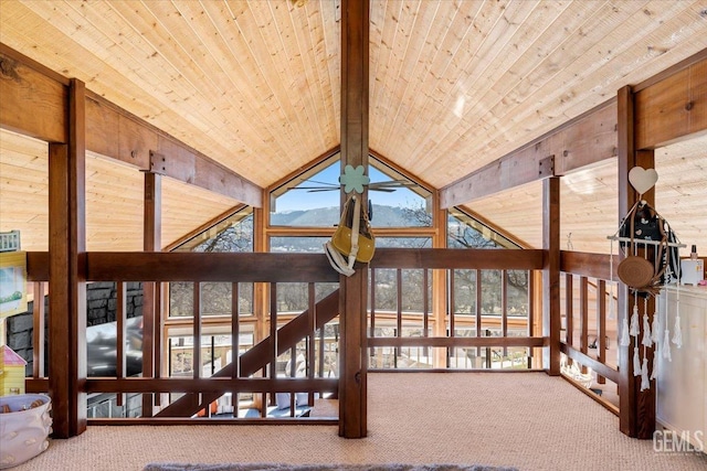 details with carpet floors, wood ceiling, beamed ceiling, and a ceiling fan