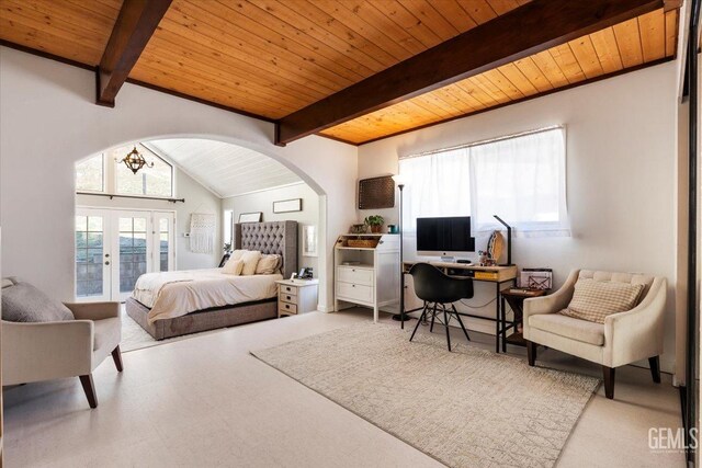 bedroom with lofted ceiling with beams, wooden ceiling, access to exterior, and french doors