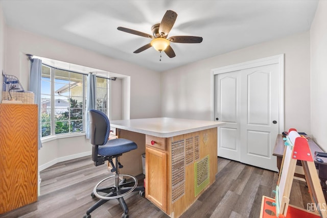 9913 Mark Twain Ave, Bakersfield, CA 93312 - office space featuring dark wood-style flooring and a ceiling fan