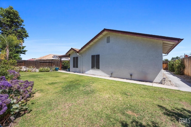9913 Mark Twain Ave, Bakersfield, CA 93312 - back of property with stucco siding and a fenced backyard