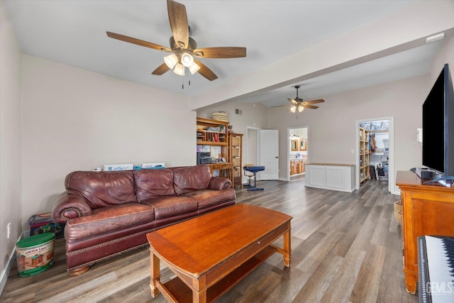9913 Mark Twain Ave, Bakersfield, CA 93312 - living room with a ceiling fan and light wood-style floors