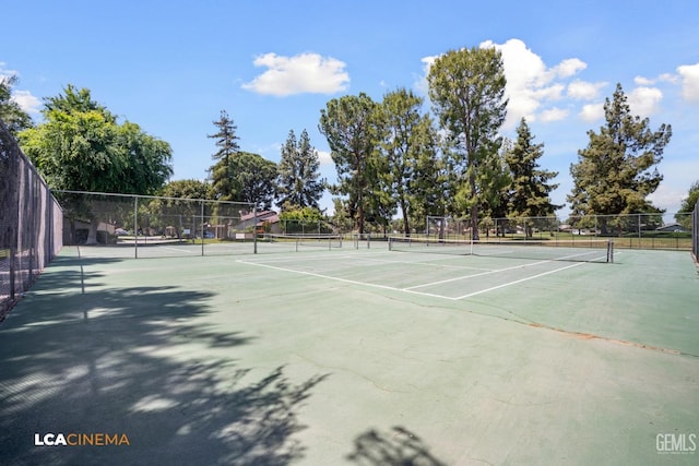 view of sport court with fence