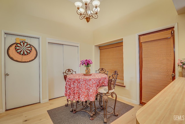 6901 Shelby Loop, Bakersfield, CA 93309 - dining space with a chandelier and light wood-style flooring