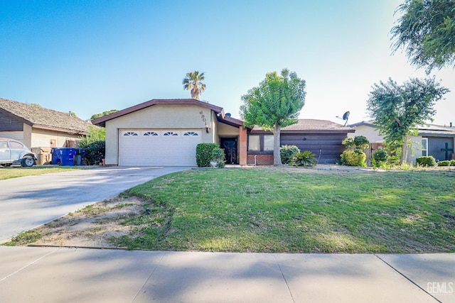 6901 Shelby Loop, Bakersfield, CA 93309 - single story home featuring an attached garage, driveway, a front yard, and stucco siding