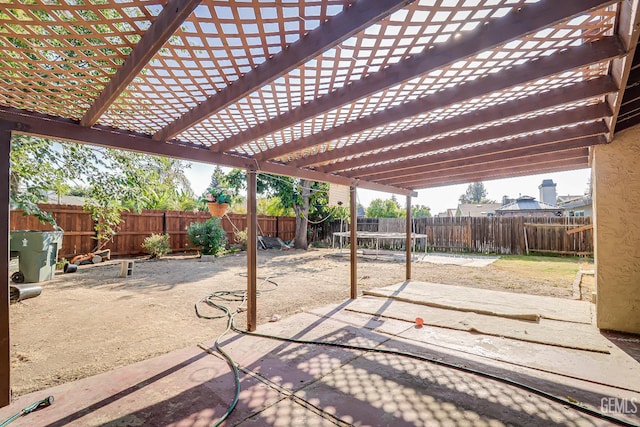 6901 Shelby Loop, Bakersfield, CA 93309 - fenced backyard with a patio and a pergola