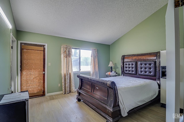 6901 Shelby Loop, Bakersfield, CA 93309 - bedroom with wood finished floors and a textured ceiling