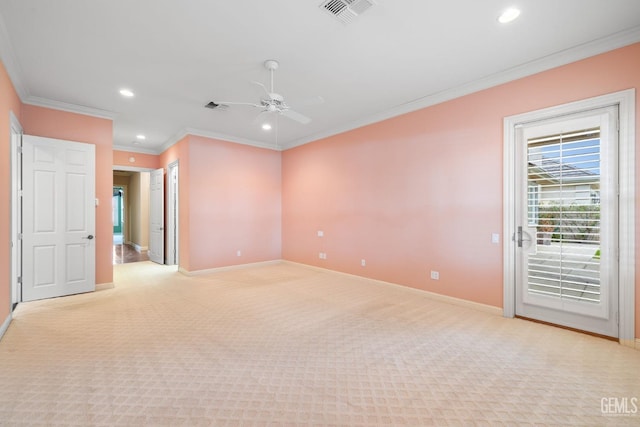 unfurnished room featuring ornamental molding, light carpet, and ceiling fan