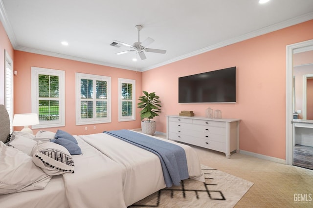 bedroom with crown molding, ceiling fan, and light carpet