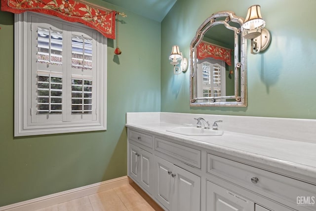 bathroom featuring tile patterned floors and vanity