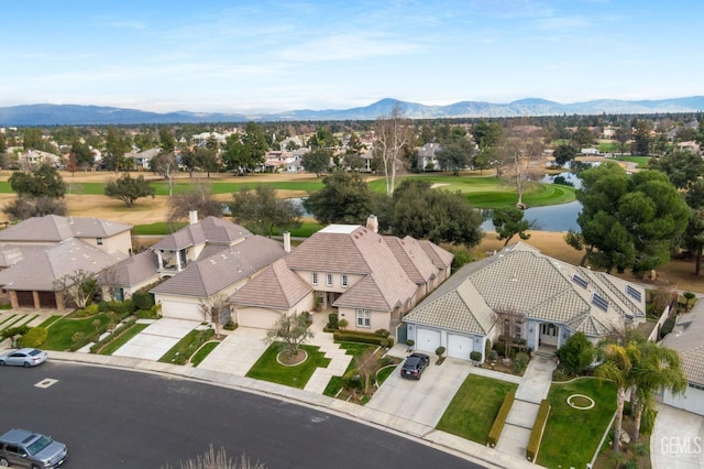 birds eye view of property featuring a mountain view