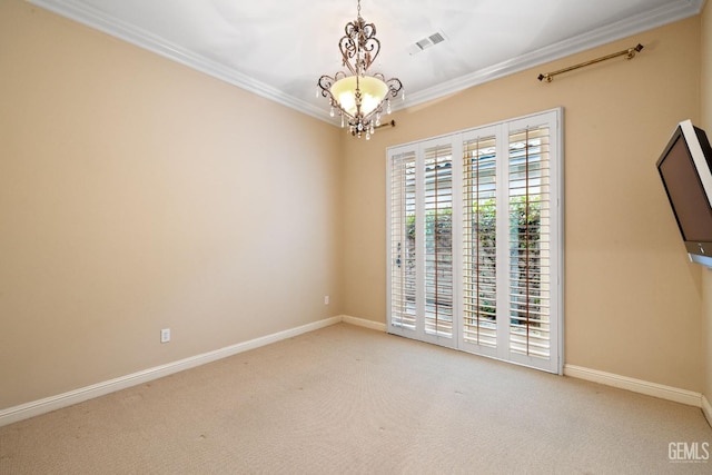 unfurnished room with light carpet, ornamental molding, and an inviting chandelier