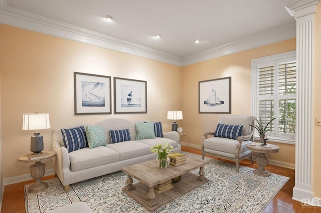 living room with hardwood / wood-style flooring, ornamental molding, and ornate columns