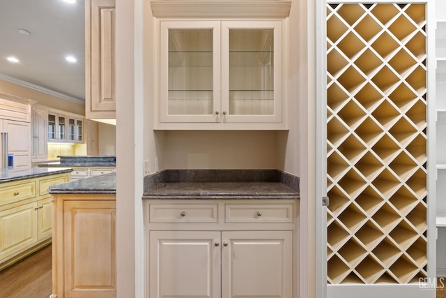 wine room featuring crown molding