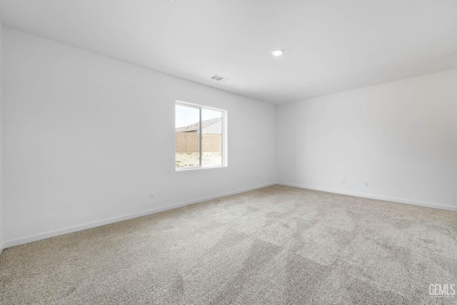 4912 Beaverhead Ave, Bakersfield, CA 93306 - carpeted empty room with baseboards and recessed lighting