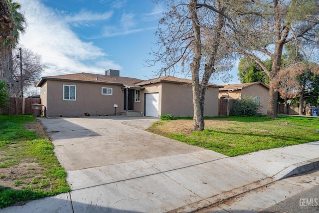 ranch-style house featuring stucco siding, fence, concrete driveway, an attached garage, and a front yard