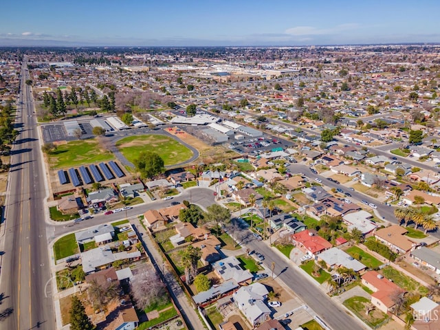 birds eye view of property with a residential view