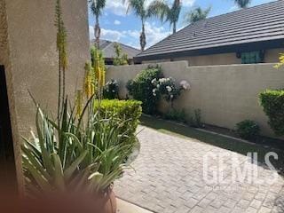 exterior space with a fenced backyard