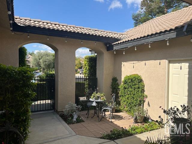 view of patio featuring fence