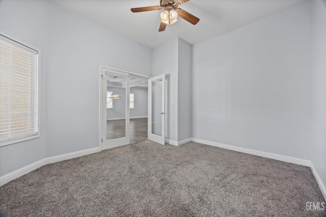 unfurnished bedroom with carpet, french doors, baseboards, and ceiling fan