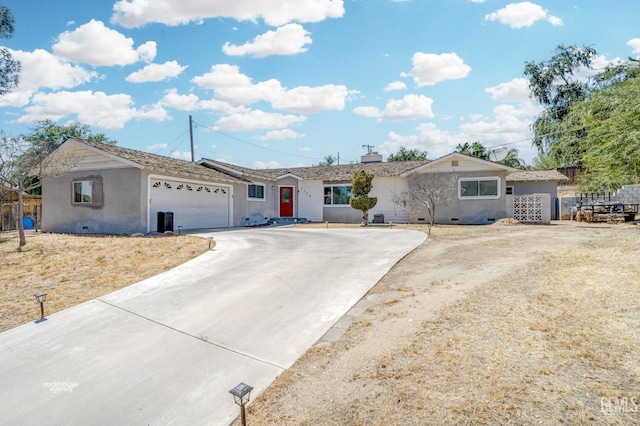 single story home with a garage