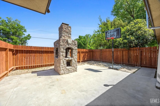 295 Walnut St, Shafter, CA 93263 - view of patio featuring a fenced backyard