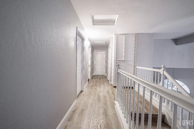 hall featuring light hardwood / wood-style flooring