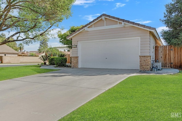 garage featuring a yard