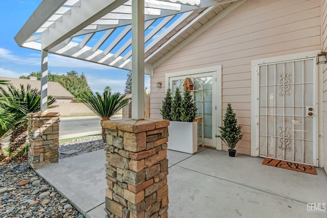 view of patio featuring a pergola