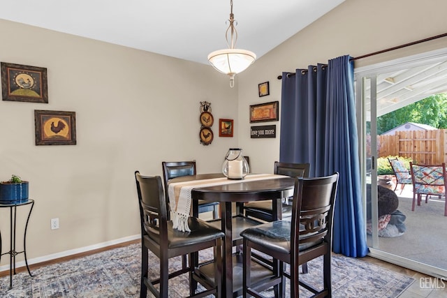 dining room with hardwood / wood-style flooring