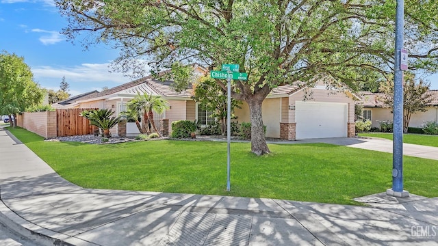 single story home featuring a garage and a front lawn