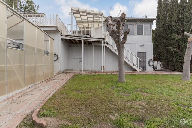 726 D St, Taft, CA 93268 - exterior space with stairway and an exterior structure