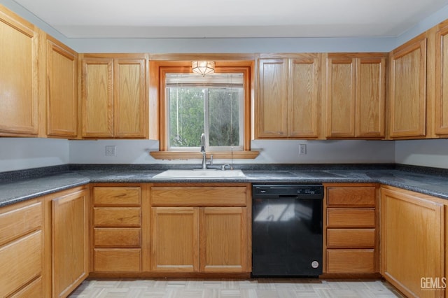 726 D St, Taft, CA 93268 - kitchen featuring black dishwasher, dark countertops, and a sink