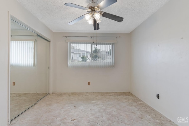 726 D St, Taft, CA 93268 - carpeted spare room with a ceiling fan and a textured ceiling