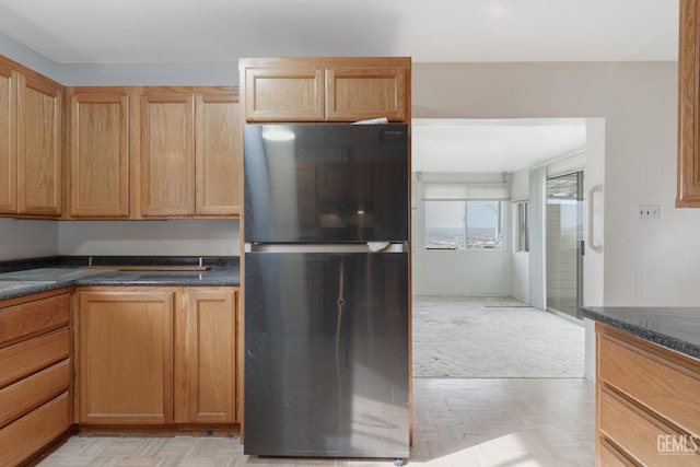 726 D St, Taft, CA 93268 - kitchen featuring freestanding refrigerator