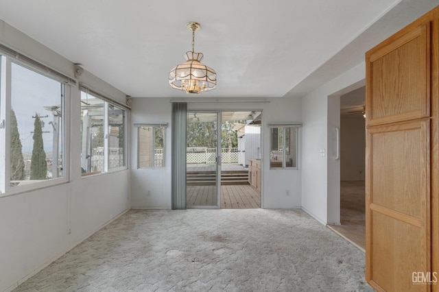 726 D St, Taft, CA 93268 - unfurnished dining area featuring carpet floors and an inviting chandelier