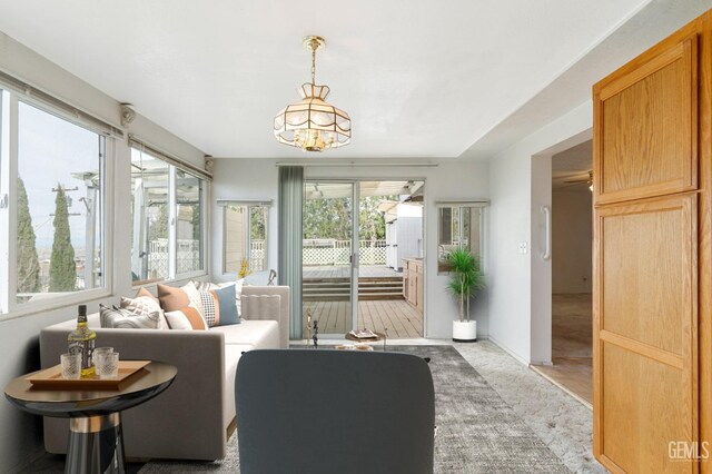 726 D St, Taft, CA 93268 - interior space featuring a chandelier and light colored carpet