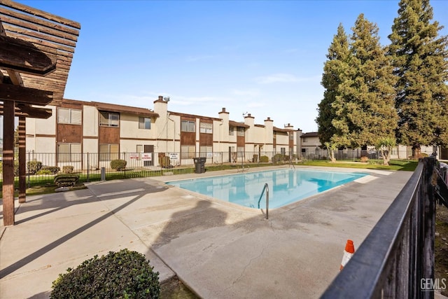 view of pool featuring a patio area