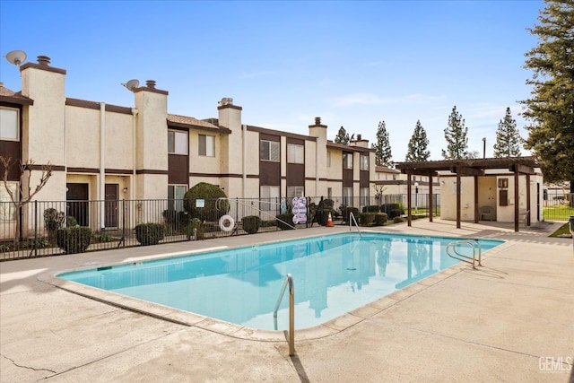 view of pool featuring a pergola and a patio area