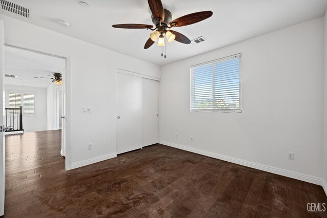 spare room with ceiling fan