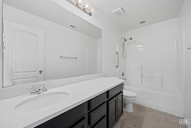 full bathroom featuring tile patterned flooring, vanity,  shower combination, and toilet