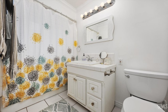 bathroom with tile patterned floors, toilet, ornamental molding, curtained shower, and vanity