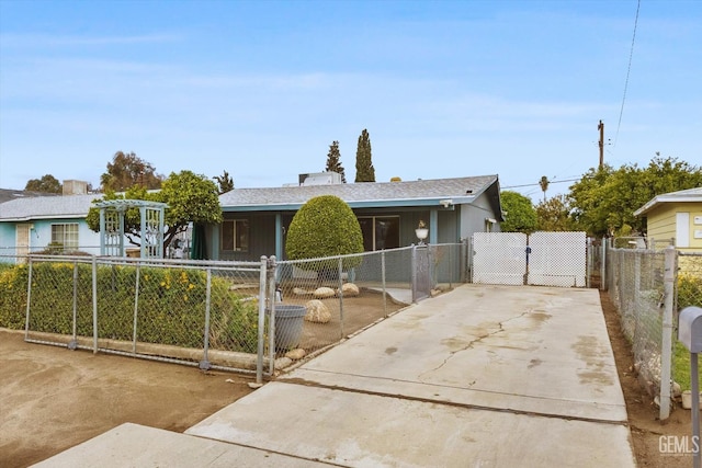 view of front of home featuring a gate and a fenced front yard