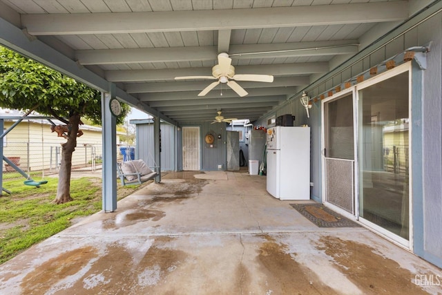 view of patio / terrace featuring ceiling fan and fence