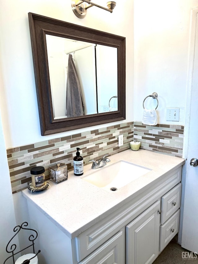 615 Cherokee Dr, Bakersfield, CA 93309 - bathroom featuring vanity and backsplash