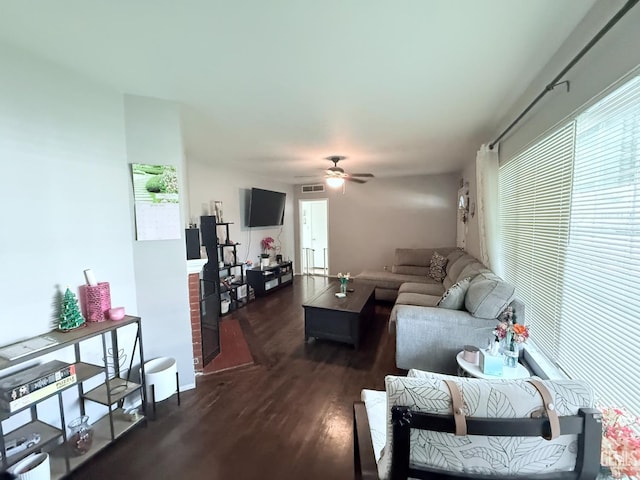 615 Cherokee Dr, Bakersfield, CA 93309 - living room with dark wood finished floors and a ceiling fan