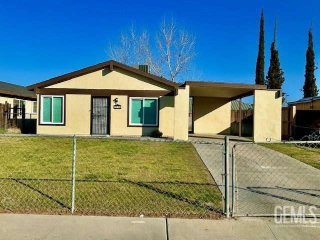 ranch-style home with a front yard and a carport