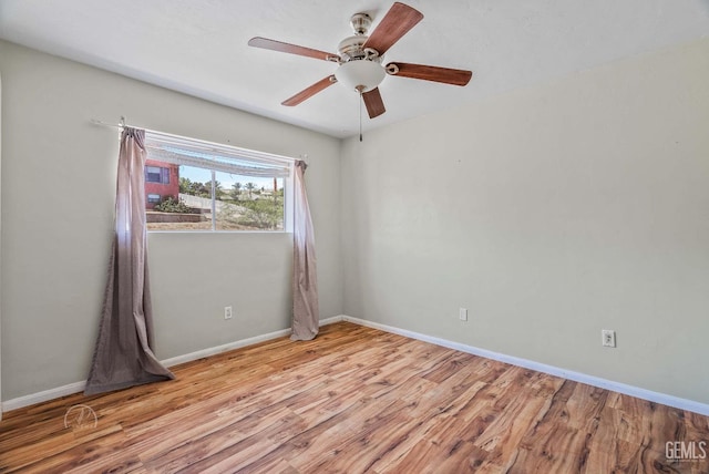 728 D St, Taft, CA 93268 - unfurnished room with light wood-style floors, a ceiling fan, and baseboards
