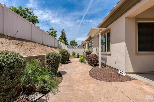 exterior space featuring a fenced backyard