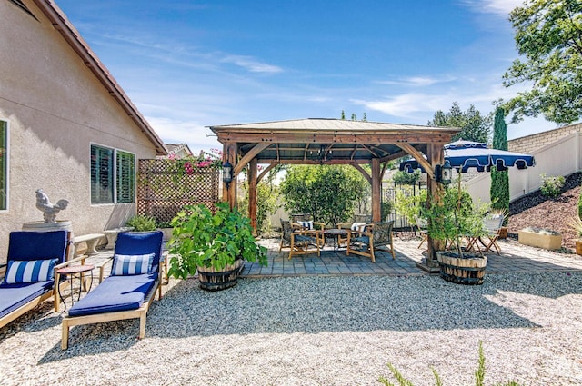 14030 Sandstone Peak Dr, Bakersfield, CA 93306 - fenced backyard featuring a gazebo, a patio, and an outdoor living space
